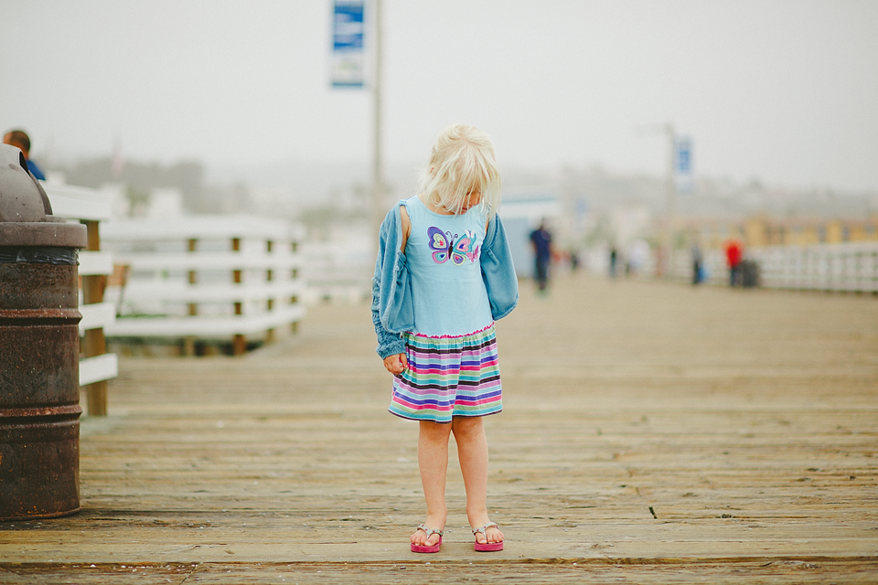 orange county photographer beach boardwalk monterey pier girl walking family portrait photographer orange county, los angeles, san diego family portrait photographer